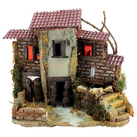 Nativity setting, rustic village with electric fountain