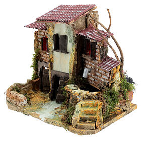 Nativity setting, rustic village with electric fountain