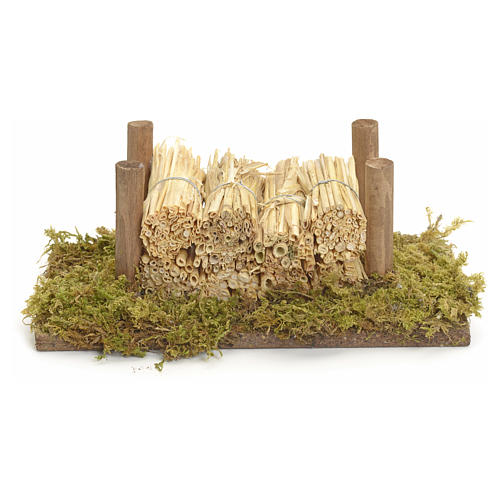 Nativity accessory, wood stack on moss with straw 1