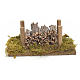 Nativity accessory, wood stack on moss s1
