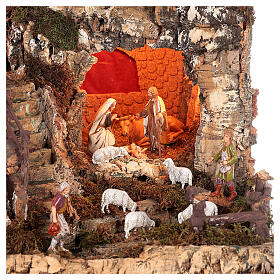 Nativity village with fire, lights, waterfall and pond 55x75x50 cm