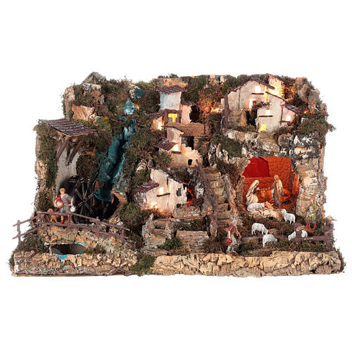 Nativity village with fire, lights, waterfall and pond 55x75x50 cm 1