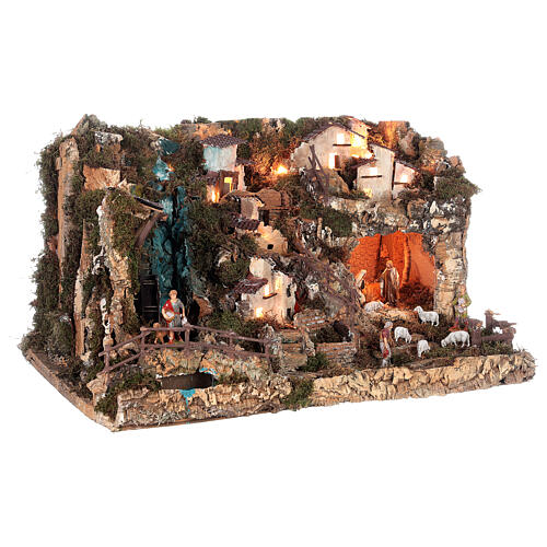 Nativity village with fire, lights, waterfall and pond 55x75x50 cm 5