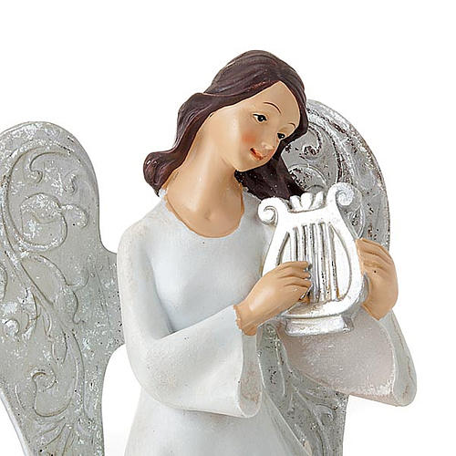 Statuine Tre Angeli con strumenti bianco e argentato