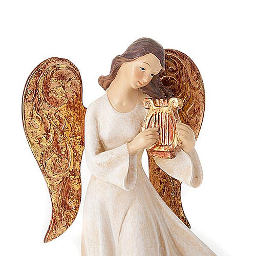 Estatuillas tres ángeles con instrumentos blancos y dorad 5