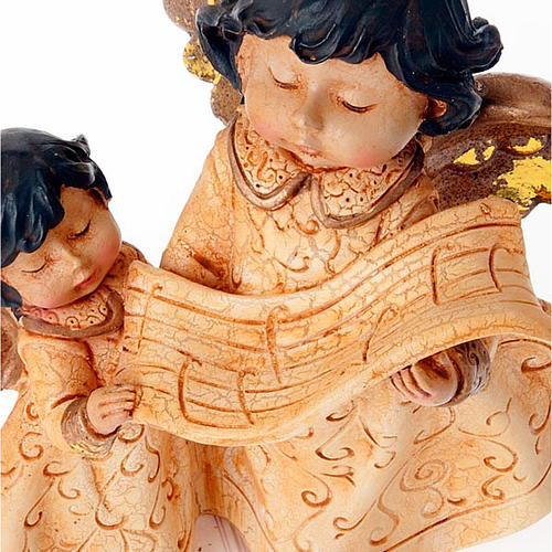 Christmas decoration angels pair with music score 5