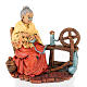 Mujer anciana que hila 13 cm. s1