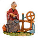 Mujer anciana que hila 13 cm. s3