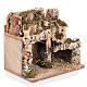 Nativity scene setting with houses and grotto s3