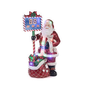Fibreglass Santa Claus with electric countdown and LED lights, h 160 cm, music