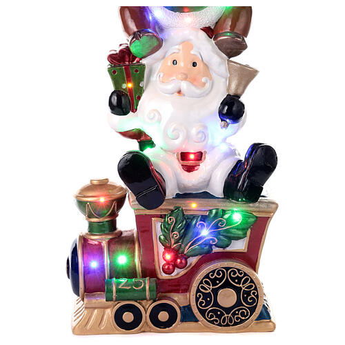 Christmas fibreglass decoration with Santa, reindeer and snowman on a train, h 180 cm, LED lights 4