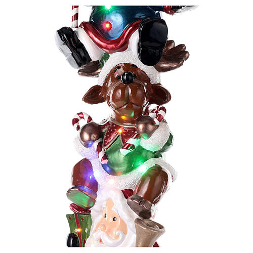 Papá Noel reno y muñeco de nieve en tren h 180 cm LED 8