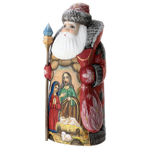 Red Ded Moroz with Holy Family and staff, carved wood, 9 in 4