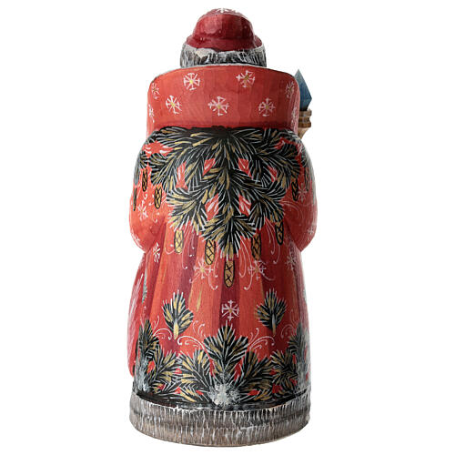 Red Ded Moroz with Holy Family and staff, carved wood, 9 in 5