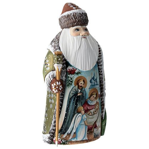 Green Ded Moroz with Holy Family, carved wood, 9 in 3