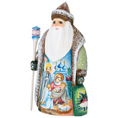 Brown Ded Moroz with Holy Family, carved wood, 9 in 3