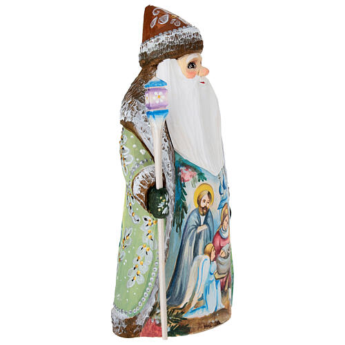 Brown Ded Moroz with Holy Family, carved wood, 9 in 4