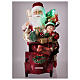 Papá Noel en trineo con regalo luces movimientos 40x40x20 cm s2