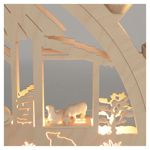 Arco natalizio 9 figure 8 cm Paul legno naturale Val Gardena LED 40x65x5 cm 9