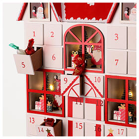 Adventskalender Haus der Weihnachtsmänner, rot-weiß, LED, 36,5x28,5x7 cm