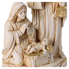 Nativity, ivory and golden resin, 4 in