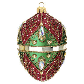 Hand-decorated green and red blown glass egg-shaped bauble, 5x3 in