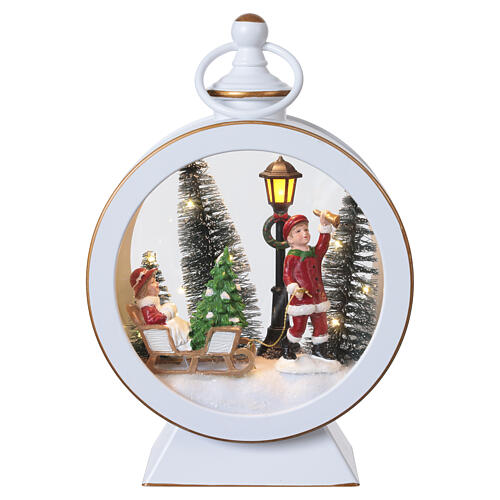 Round white Christmas lantern with children on sled and lights 25cm Bagutta Tendence 1