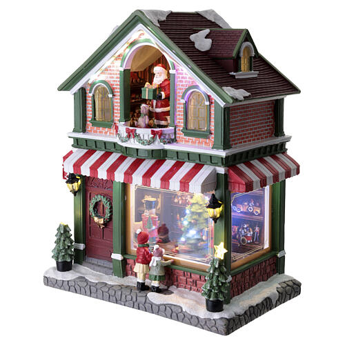Villaggio negozio di giocattoli natalizio animato led 40x35x20 cm 3