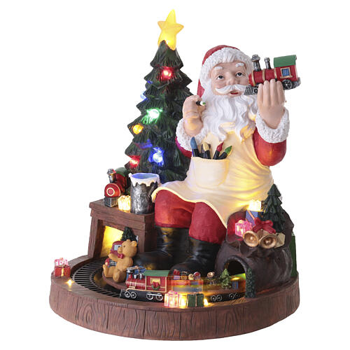 Boîte à musique de Noël Père Noël et jouets animé, lumières LED 40x40 cm 3