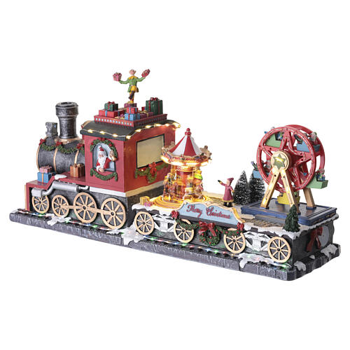 Animated Christmas train with LED lights, elf and carousel, 10x20x6 in 4