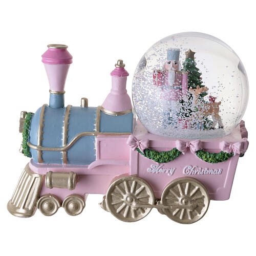 Globo de neve de vidro com quebra-nozes e comboio cor-de-rosa 15x20x10 cm 3