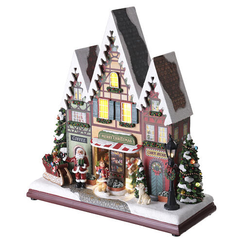 Scène de ville de Noël animée avec éclairage LED 35x30x15 cm 3
