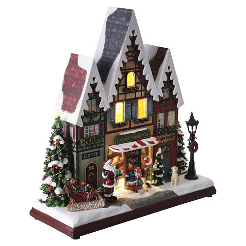 Scène de ville de Noël animée avec éclairage LED 35x30x15 cm 4