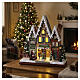 Città natalizia animata con illuminazione led 35x30x15 cm s2