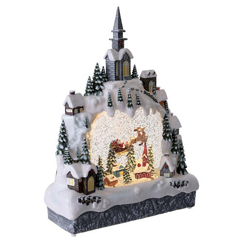 Aldeia de Natal em arco com Pai Natal no trenó efeito purpurina 35x25x10 cm 4