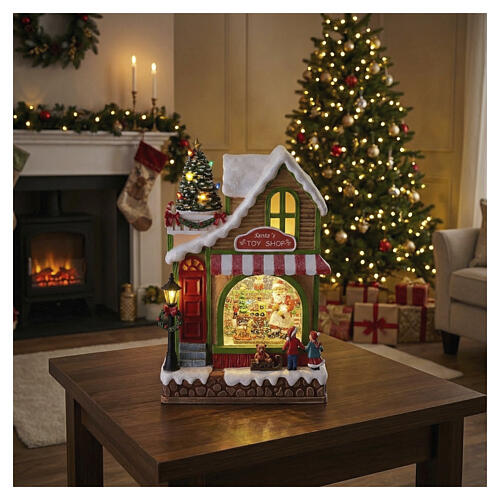 Décor magasin de jouets de Noël animé avec Père Noël et LED 30x15x20 cm 2