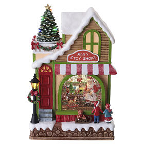 Animated Santa's Toy Shop Christmas decoration with LED lights, 30x15x20 cm