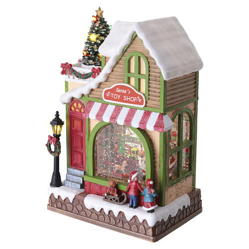 Animated Santa's Toy Shop Christmas decoration with LED lights, 30x15x20 cm 3