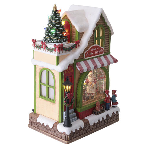 Animated Santa's Toy Shop Christmas decoration with LED lights, 30x15x20 cm 5
