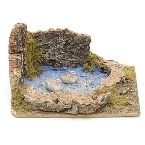 Nativity setting, geese and chicks in a lake 1