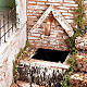Nativity grotto with village and fountain s4
