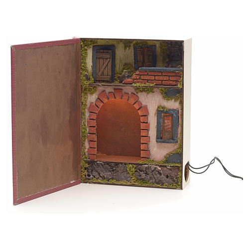 Illuminated village with grotto inside book 30x24x8 1