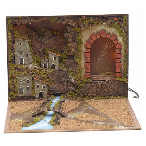 Illuminated village with river for nativities inside a book 24x3 1