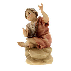 Boy Sitting with Bonfire, 12 cm Original Nativity model, in painted Valgardena wood