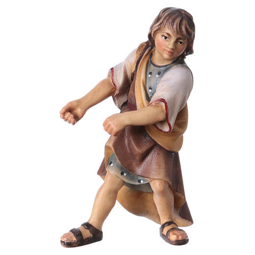 Niño que tira belén Original madera pintada Val Gardena 12 cm 1