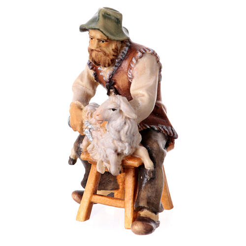 Berger assis qui tond crèche Original bois peint Val Gardena 10 cm 2