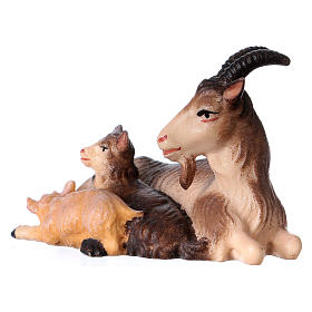 Goat resting with two goats, 12 cm Original Nativity model, in painted Valgardena wood