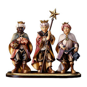 Tres pequeños coristas sobre pedestal belén Original madera pintada Val Gardena 10 cm