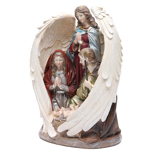 Holy family with angel measuring 31cm, in resin with natural finish 2