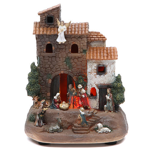 Holy family with house measuring 17cm, in resin 1